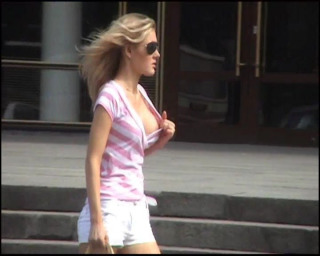 Girl flashing her tits in the street