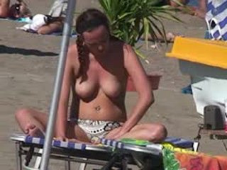 Girls getting tan topless