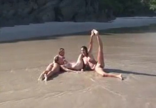 Lazuli Joan and Seriya get tan on the beach