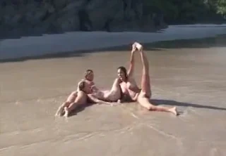 Lazuli Joan and Seriya get tan on the beach